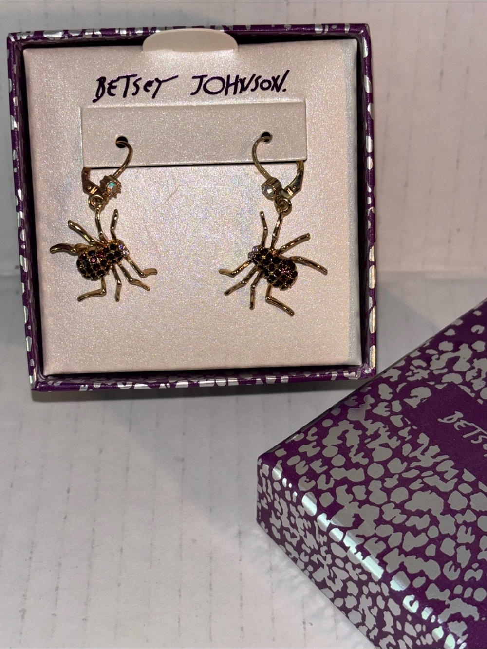 Betsey Johnson Gold Spider Drop Earrings with Black and Purple Stones